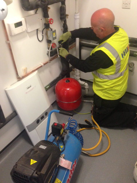 Engineer checking a boiler